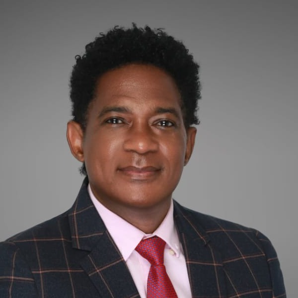 Headshot of Austin Akpehe, Founding President of KCCIMA