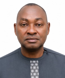 Headshot of Dr. Joseph Terna Anom, Founding Official of KCCIMA
